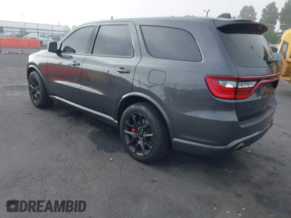 2023 Dodge Durango SRT 392 Premium z VIN 1C4SDJGJ2PC692935, wystawiony jako IAAI lot #41029734 z przebiegiem 7 191 mil mil oraz . Historia ofert i sprzedaży dostępna na DreamBid. Obrazek 3.