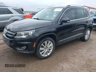 2012 Volkswagen Tiguan SE z VIN WVGBV7AX0CW558863, wystawiony jako IAAI lot #42285870 z przebiegiem 158 521 mil mil oraz . Historia ofert i sprzedaży dostępna na DreamBid. Obrazek 17.