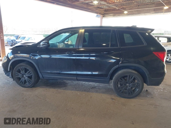 2021 Honda Passport Sport with VIN 5FNYF8H27MB021098, listed as a IAAI auction lot 41333241 with 101,239 mi miles and . Bid and sale history available at DreamBid. Image 14.