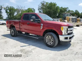 2017 Ford F-250 XLT with VIN 1FT7X2B63HEF07545, listed as a Copart auction lot 56399375 with 216,438 mi miles and Salvage title. Bid and sale history available at DreamBid. Image 4.