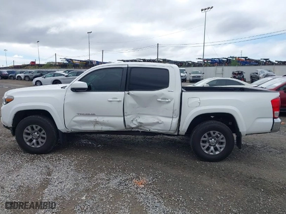 2017 Toyota Tacoma SR5 with VIN 3TMAZ5CN9HM040066, listed as a IAAI auction lot 41490470 with 119,221 mi miles. Bid and sale history available at carsss.com. Image 14.