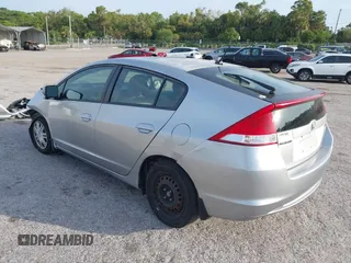 2010 Honda Insight LX with VIN JHMZE2H55AS039854, listed as a IAAI auction lot 42086147 with 153,555 mi miles and . Bid and sale history available at DreamBid. Image 3.