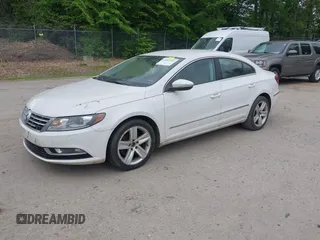 2013 Volkswagen CC Sport z VIN WVWAN7AN6DE537246, wystawiony jako IAAI lot #42361502 z przebiegiem 192 999 mil mil oraz . Historia ofert i sprzedaży dostępna na DreamBid. Obrazek 2.