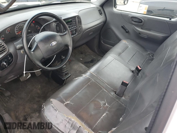 2003 Ford F-150 XL with VIN 1FTRF18W03NA77544, listed as a Copart auction lot 84805894 with Not provided miles and Salvage title. Bid and sale history available at DreamBid. Image 8.