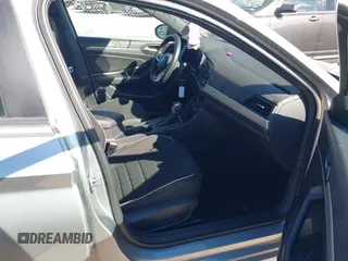 2023 Volkswagen Jetta Sport with VIN 3VWBM7BU5PM016768, listed as a IAAI auction lot 41427777 with 32,950 mi miles and . Bid and sale history available at DreamBid. Image 5.