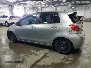 2009 Toyota Yaris with VIN JTDKT903X95231860, listed as a Copart auction lot 51908185 with 135,701 mi miles and Salvage Title. Bid and sale history available at carsss.com. Image 2.