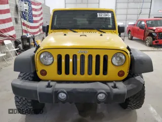 2011 Jeep Wrangler Sport with VIN 1J4GA2D17BL556764, listed as a Copart auction lot 50212845 with 88,973 mi miles and Clean Title. Bid and sale history available at carsss.com. Image 5.