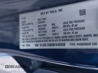 2021 Tesla Model 3 Long Range with VIN 5YJ3E1EB8MF848049, listed as a IAAI auction lot 40974331 with 61,462 mi miles. Bid and sale history available at carsss.com. Image 9.