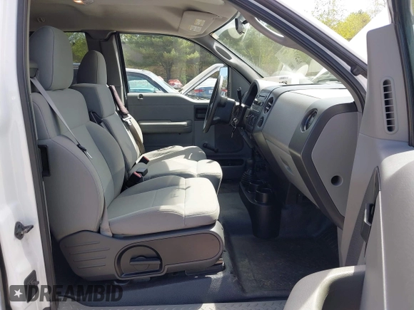 2007 Ford F-150 STX with VIN 1FTRX14W57NA64653, listed as a IAAI auction lot 42168578 with 155,833 mi miles and . Bid and sale history available at DreamBid. Image 5.