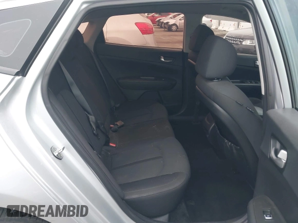 2018 Kia Optima S with VIN 5XXGT4L35JG216039, listed as a IAAI auction lot 42451216 with 91,679 mi miles and . Bid and sale history available at DreamBid. Image 8.