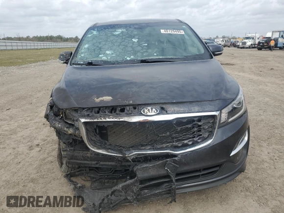 2021 Kia Sedona LX with VIN KNDMB5C17M6665266, listed as a Copart auction lot 48129495 with 57,274 mi miles and Salvage Title. Bid and sale history available at carsss.com. Image 5.