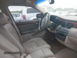 2004 Cadillac DeVille z VIN 1G6KD54Y74U236897, wystawiony jako IAAI lot #42058904 z przebiegiem 75 226 mil mil oraz . Historia ofert i sprzedaży dostępna na DreamBid. Obrazek 5.