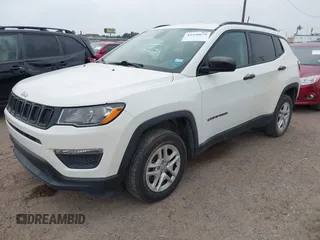 2017 Jeep Compass Sport with VIN 3C4NJDAB5HT641928, listed as a IAAI auction lot 42330679 with 142,499 mi miles and . Bid and sale history available at DreamBid. Image 2.