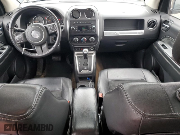 2014 Jeep Compass Latitude with VIN 1C4NJDEB4ED601769, listed as a Copart auction lot 48901365 with 129,826 mi miles and Salvage Title. Bid and sale history available at carsss.com. Image 8.