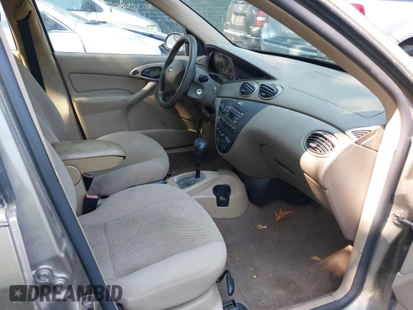2004 Ford Focus SE z VIN 1FAFP36324W186481, wystawiony jako IAAI lot #42654016 z przebiegiem 168 331 mil mil oraz . Historia ofert i sprzedaży dostępna na DreamBid. Obrazek 5.