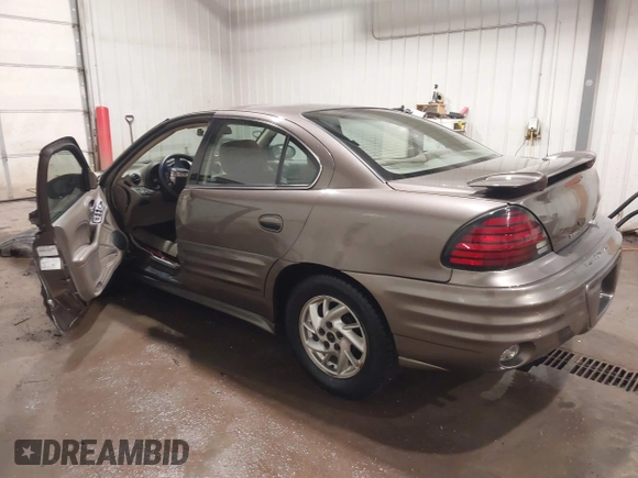 2002 Pontiac Grand Am SE1 z VIN 1G2NF52FX2C128240, wystawiony jako IAAI lot #41356415 z przebiegiem 15 900 mil mil oraz . Historia ofert i sprzedaży dostępna na DreamBid. Obrazek 3.