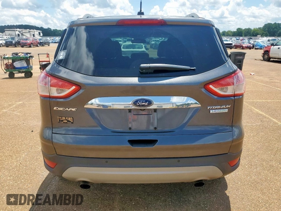 2015 Ford Escape Titanium with VIN 1FMCU0J92FUB80769, listed as a Copart auction lot 61988435 with 103,212 mi miles and Salvage title. Bid and sale history available at DreamBid. Image 6.