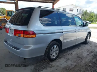2003 Honda Odyssey EX-L z VIN 5FNRL18933B087714, wystawiony jako IAAI lot #42510813 z przebiegiem 145 360 mil mil oraz . Historia ofert i sprzedaży dostępna na DreamBid. Obrazek 4.