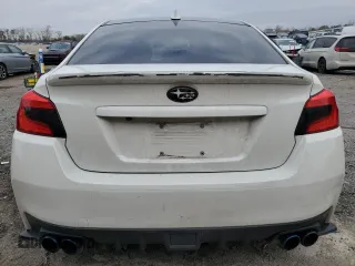 2016 Subaru WRX Premium with VIN JF1VA1E62G9824048, listed as a Copart auction lot 85634094 with 118,180 mi miles and Salvage Title. Bid and sale history available at carsss.com. Image 6.