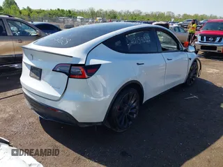 2021 Tesla Model Y Performance z VIN 5YJYGDEF0MF076263, wystawiony jako IAAI lot #42134022 z przebiegiem Nie podano mil oraz . Historia ofert i sprzedaży dostępna na DreamBid. Obrazek 4.