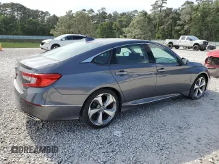 2018 Honda Accord Touring z VIN 1HGCV1F93JA149932, wystawiony jako Copart lot #52680825 z przebiegiem 50 179 mil mil oraz Czysty tytuł • Clean title. Historia ofert i sprzedaży dostępna na DreamBid. Obrazek 3.