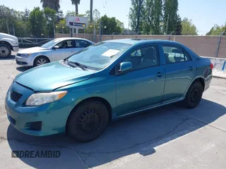 2009 Toyota Corolla with VIN 2T1BU40E29C159363, listed as a IAAI auction lot 42140431 with 147,477 mi miles and . Bid and sale history available at carsss.com. Image 2.