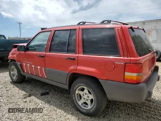 1997 Jeep Grand Cherokee Laredo with VIN 1J4GZ58S3VC739922, listed as a Copart auction lot 55667885 with 209,075 mi miles and Salvage title. Bid and sale history available at DreamBid. Image 2.