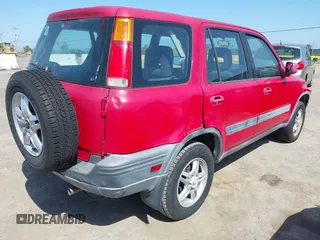1999 Honda CR-V EX with VIN JHLRD1860XC030573, listed as a IAAI auction lot 42175367 with 182,192 mi miles. Bid and sale history available at carsss.com. Image 4.