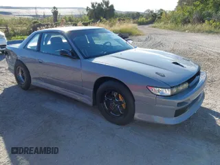 1992 Nissan 240SX z VIN JN1MS34P9NW100593, wystawiony jako IAAI lot #40867667 z przebiegiem Nie podano mil oraz . Historia ofert i sprzedaży dostępna na DreamBid. Obrazek 1.