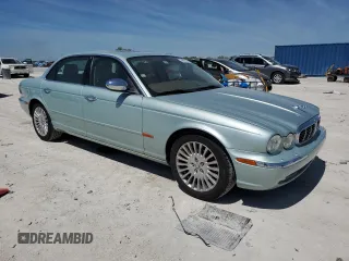 2005 Jaguar XJ Vanden Plas z VIN SAJWA82CX5SG35644, wystawiony jako Copart lot #49029245 z przebiegiem 88 771 mil mil oraz Szkoda całkowita • Salvage title. Historia ofert i sprzedaży dostępna na DreamBid. Obrazek 4.