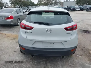 2016 Mazda CX-3 Grand Touring with VIN JM1DKDD72G0128891, listed as a IAAI auction lot 41401456 with 60,911 mi miles. Bid and sale history available at carsss.com. Image 16.