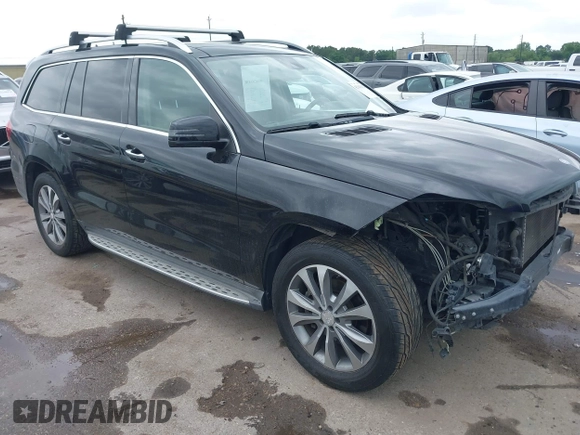 2014 Mercedes-Benz GL 450 with VIN 4JGDF7CE0EA372225, listed as a IAAI auction lot 42141012 with 158,045 mi miles and . Bid and sale history available at DreamBid. Image 1.