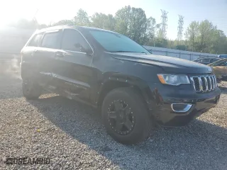 2017 Jeep Grand Cherokee Laredo with VIN 1C4RJEAG0HC647750, listed as a Copart auction lot 52619875 with 105,464 mi miles and Salvage Title. Bid and sale history available at carsss.com. Image 4.