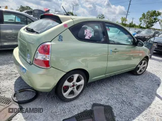 2007 Hyundai Accent SE z VIN KMHCN36C07U035170, wystawiony jako Copart lot #58201395 z przebiegiem 154 388 mil mil oraz Szkoda całkowita • Salvage title. Historia ofert i sprzedaży dostępna na DreamBid. Obrazek 3.