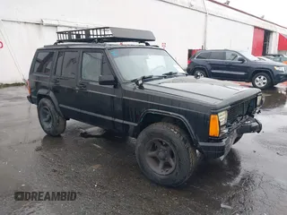 1996 Jeep Cherokee SE z VIN 1J4FJ28S9TL135564, wystawiony jako IAAI lot #41618367 z przebiegiem 249 410 mil mil oraz . Historia ofert i sprzedaży dostępna na DreamBid. Obrazek 1.