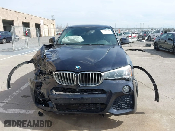 2015 BMW X4 xDrive35i with VIN 5UXXW5C50F0E87728, listed as a IAAI auction lot 41819628 with 136,042 mi miles and . Bid and sale history available at DreamBid. Image 13.