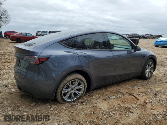 2023 Tesla Model Y Long Range z VIN 7SAYGDEE5PA164270, wystawiony jako Copart lot #50260835 z przebiegiem 17 340 mil mil oraz Szkoda całkowita • Salvage title. Historia ofert i sprzedaży dostępna na DreamBid. Obrazek 3.