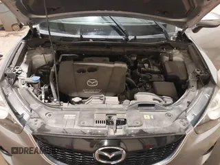 2015 Mazda CX-5 Grand Touring with VIN JM3KE4DY2F0477966, listed as a IAAI auction lot 41247178 with 116,582 mi miles. Bid and sale history available at carsss.com. Image 10.