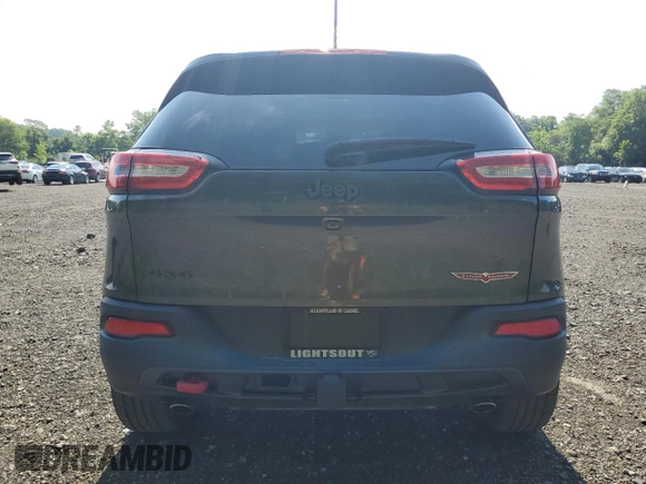 2015 Jeep Cherokee Trailhawk с VIN 1C4PJMBS3FW698997, выставлен на аукционе Copart как лот 63470875 с пробегом 107 535 миль миль и Списание • Salvage title. История ставок и продаж доступна на DreamBid. Изображение 6.