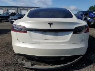 2013 Tesla Model S с VIN 5YJSA1CG2DFP25370, выставлен на аукционе Copart как лот 64003825 с пробегом 85 656 миль миль и Списание • Salvage title. История ставок и продаж доступна на DreamBid. Изображение 6.