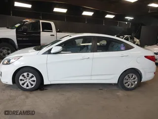 2015 Hyundai Accent GLS with VIN KMHCT4AE8FU876771, listed as a IAAI auction lot 42007229 with 63,484 mi miles. Bid and sale history available at carsss.com. Image 14.