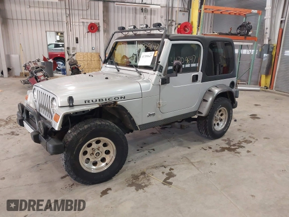 2003 Jeep Wrangler Rubicon with VIN 1J4FA69S13P375142, listed as a IAAI auction lot 41709647 with 125,443 mi miles and . Bid and sale history available at DreamBid. Image 18.
