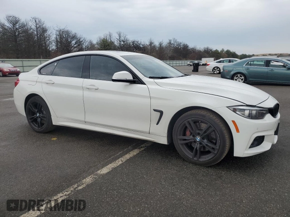 2018 BMW 4 Series 430i xDrive with VIN WBA4J3C53JBG90792, listed as a Copart auction lot 52365525 with 107,238 mi miles and Salvage Title. Bid and sale history available at DreamBid. Image 4.