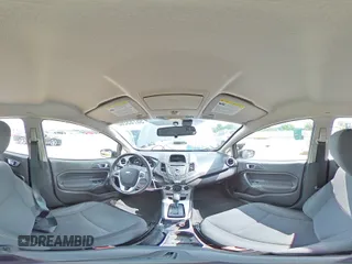 2015 Ford Fiesta SE z VIN 3FADP4BJ2FM114569, wystawiony jako Copart lot #56785265 z przebiegiem 71 045 mil mil oraz Szkoda całkowita • Salvage title. Historia ofert i sprzedaży dostępna na DreamBid. Obrazek 14.
