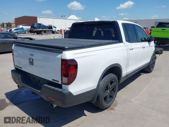 2023 Honda Ridgeline Black Edition with VIN 5FPYK3F8XPB009920, listed as a IAAI auction lot 42086798 with 37,192 mi miles and . Bid and sale history available at DreamBid. Image 4.