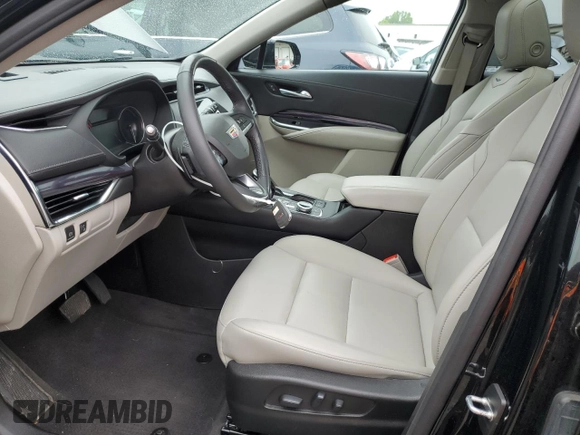 2023 Cadillac XT4 AWD Luxury with VIN 1GYFZBR42PF152462, listed as a Copart auction lot 58494825 with 35,078 mi miles and Salvage title. Bid and sale history available at DreamBid. Image 7.