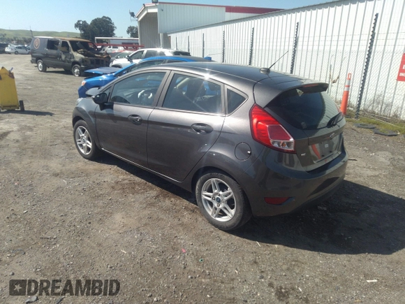2018 Ford Fiesta SE with VIN 3FADP4EJ0JM141953, listed as a IAAI auction lot 38529613 with 74,502 mi miles and . Bid and sale history available at DreamBid. Image 3.