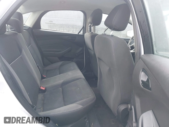 2013 Ford Focus S with VIN 1FADP3E20DL332636, listed as a IAAI auction lot 40917274 with 112,956 mi miles. Bid and sale history available at carsss.com. Image 8.
