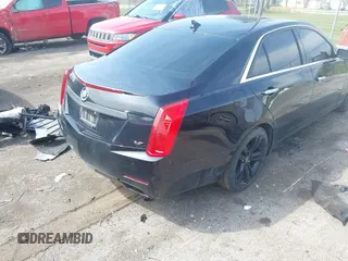 2014 Cadillac CTS Vsport Premium RWD z VIN 1G6AV5S8XE0143389, wystawiony jako IAAI lot #42021009 z przebiegiem 95 102 mil mil oraz . Historia ofert i sprzedaży dostępna na DreamBid. Obrazek 4.