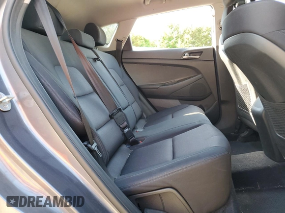 2018 Hyundai Tucson SE z VIN KM8J2CA44JU645919, wystawiony jako Copart lot #55580635 z przebiegiem Nie podano mil oraz Szkody całkowita. Historia ofert i sprzedaży dostępna na DreamBid. Obrazek 11.